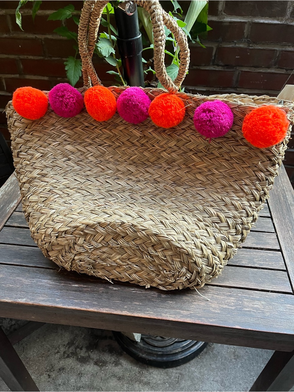 Woven Straw Tote with Bright Pom-Poms
